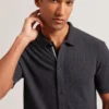 CONNYR Textured Knit Button-Through Polo Shirt